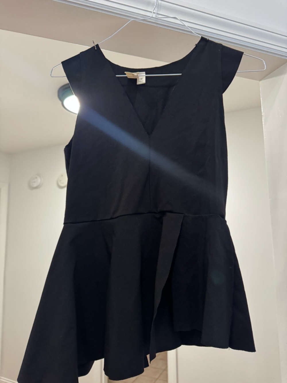Women's Black Asymmetrical Peplum Top